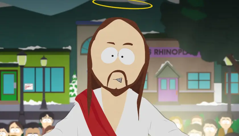 Jesus mit Heiligenschein und rotem Schal, umgeben von einer Menge. Ein Hinweis auf South Park Staffel 27.